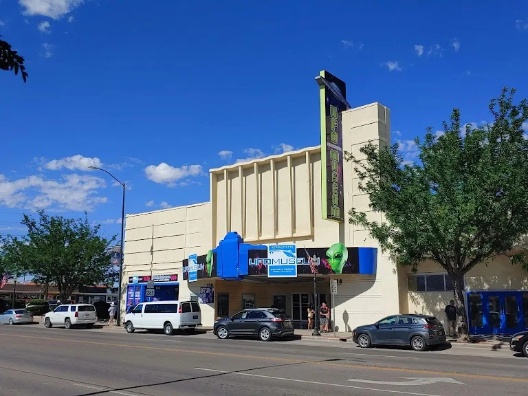 Downtown Roswell, NM—Main Street (US-285) near the International UFO Museum at dusk; streetscape used as the page’s hero background.